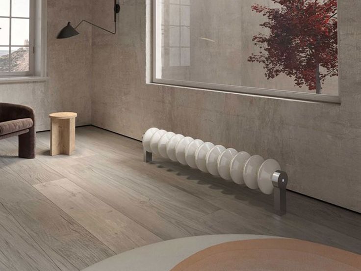 Radiateur de sol &eacute;lectrique, solution discr&egrave;te pour le b&acirc;ti ancien